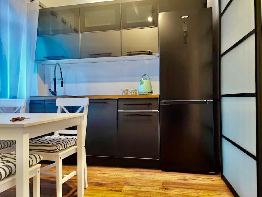 Апартаменты Loft W Starej Wozowni Крыница-Здруй Экстерьер фото